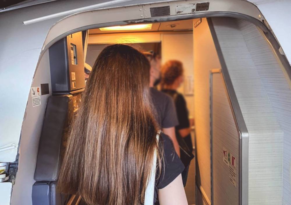 Her Hair Took Over My Airplane Seat. My Revenge Was Petty… and Delicious